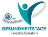 Piktogramm einer Person mit freudig erhobenen Armen und eines Baumblatts. Text im Logo: "GESUNDHEITSTAGE Friedrichshafen mit Naturheiltage".